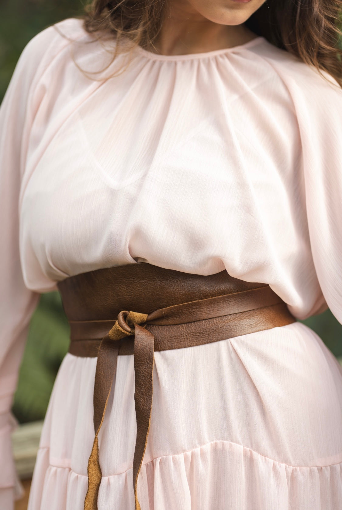 THE ALAIA DRESS IN PEACHY PINK